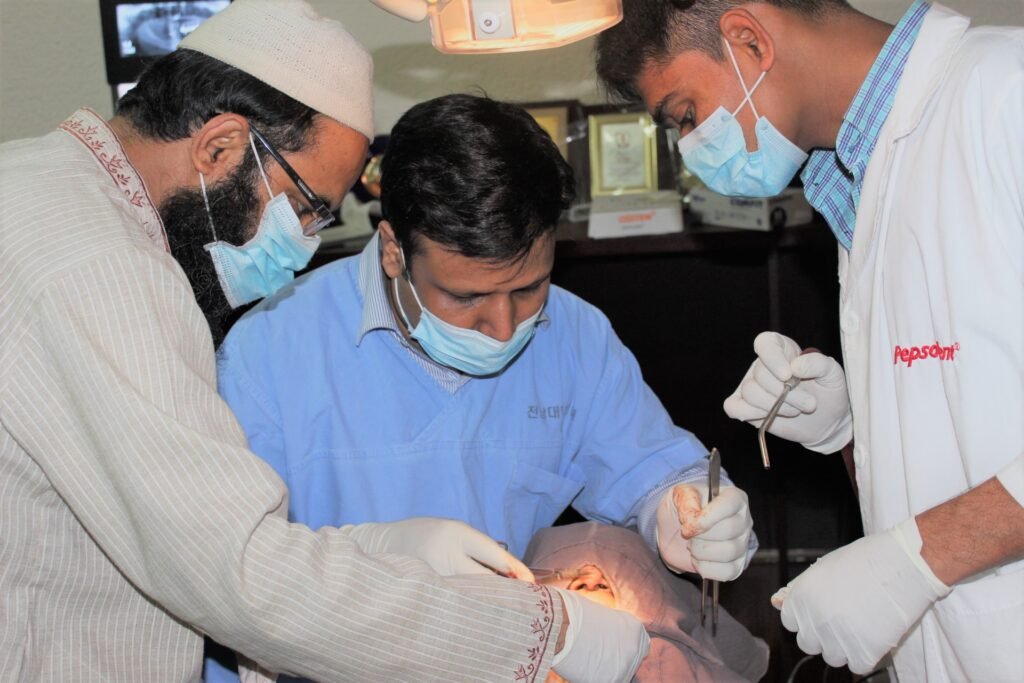 Dr. Uttom